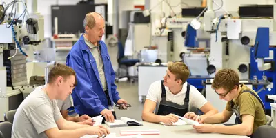 Teacher and CNC Students